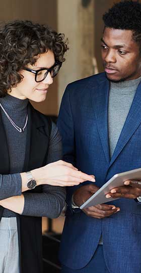 Happy co-workers collaborating